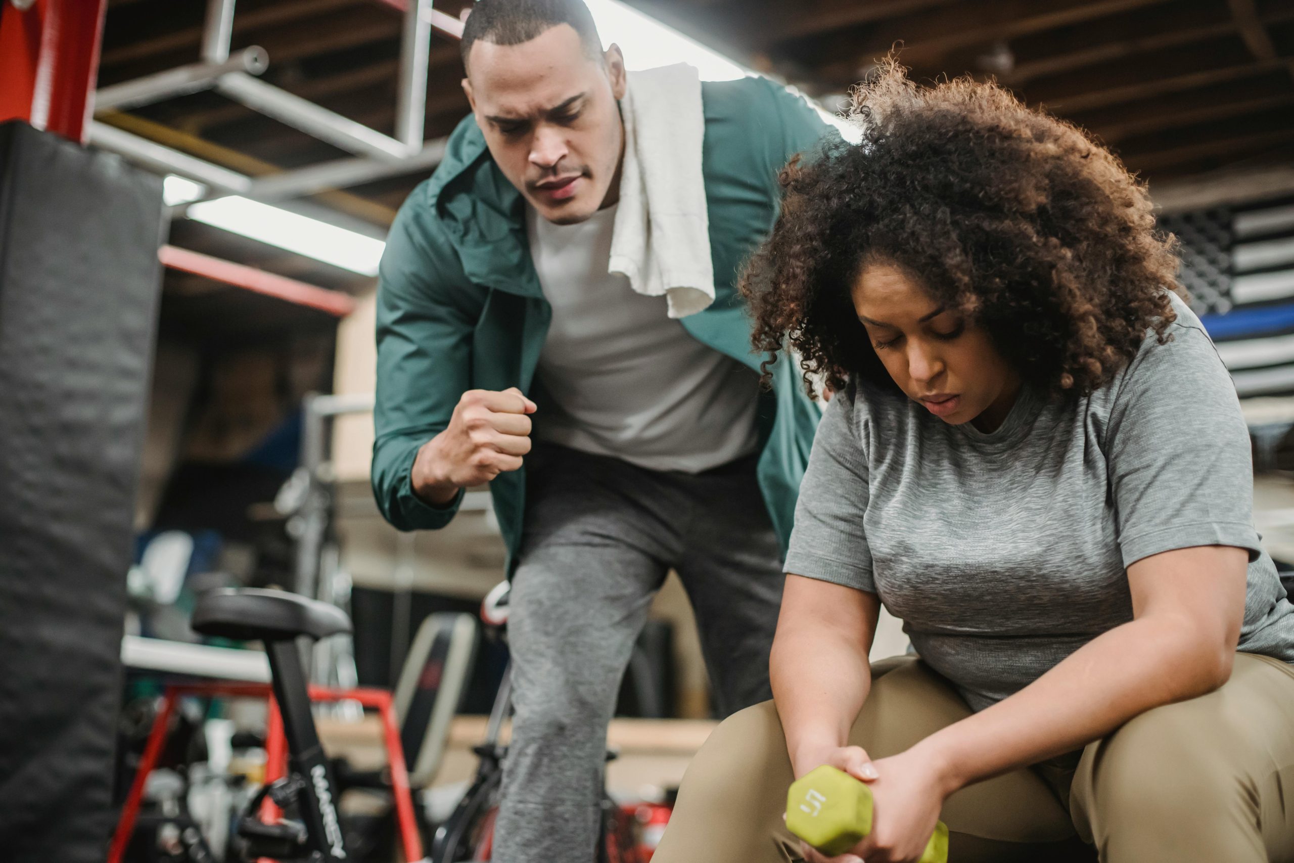 Personal trainer with a customer